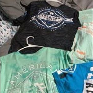 2 large American fighter t-shirts